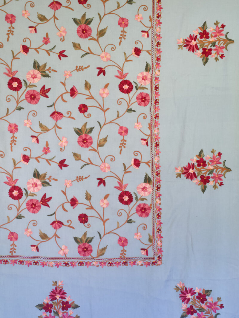 Hand-embroidered light blue floral bedspread
