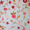 Hand-embroidered light blue floral bedspread